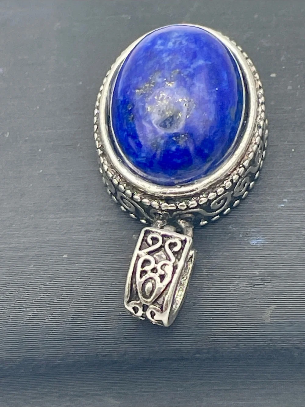 Lapis Lazuli Oval Cabochon Pendant with Silver Ornate Frame. Deep Blue Gemstone